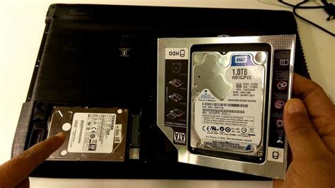 what is the metal box inside my laptop|The bit of metal that holds a laptop HDD/SSD in place.